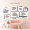 Colorful Bengaluru map poster size guide displaying seven framed artwork sizes above a blush pink sofa.