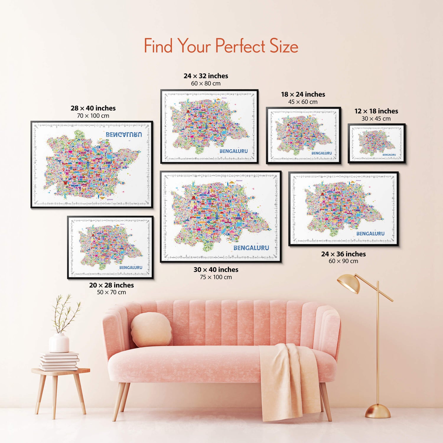 Colorful Bengaluru map poster size guide displaying seven framed artwork sizes above a blush pink sofa.
