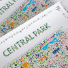 Close-up detail of Central Park illustrated map art print showing intricate typography and colorful landmarks on premium matte paper — fine art print by Alfalfa New York.