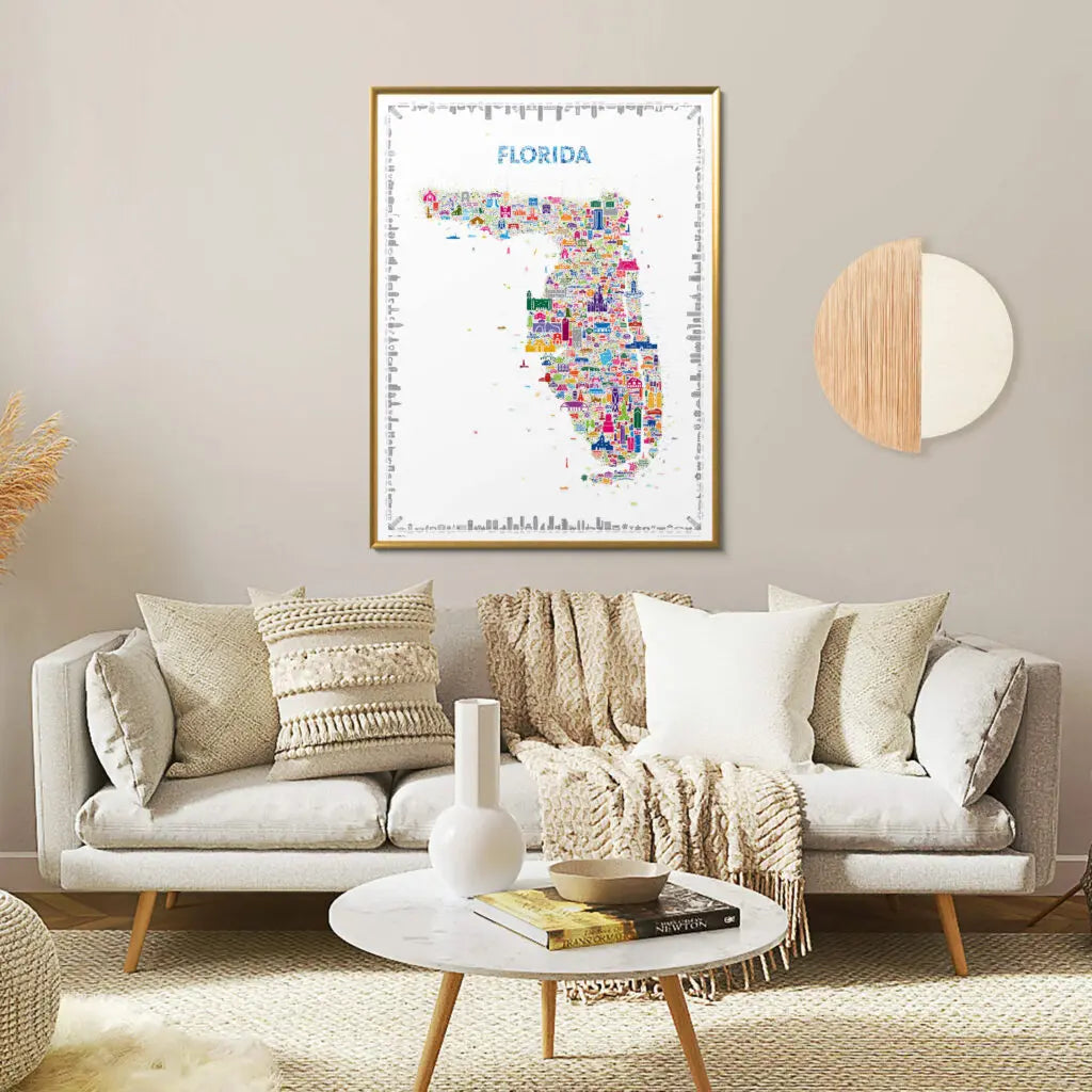 Living room with a gray sofa, decorative pillows, and a colorful Florida map poster on the wall.
