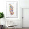 Colorful map of Manhattan framed on a wall in a modern interior setting.