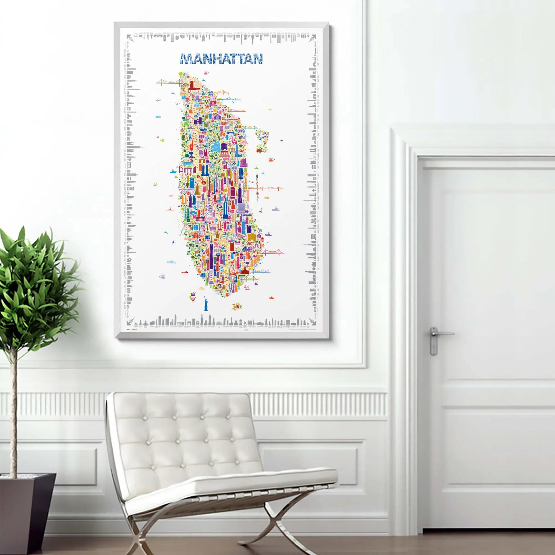 Colorful map of Manhattan framed on a wall in a modern interior setting.