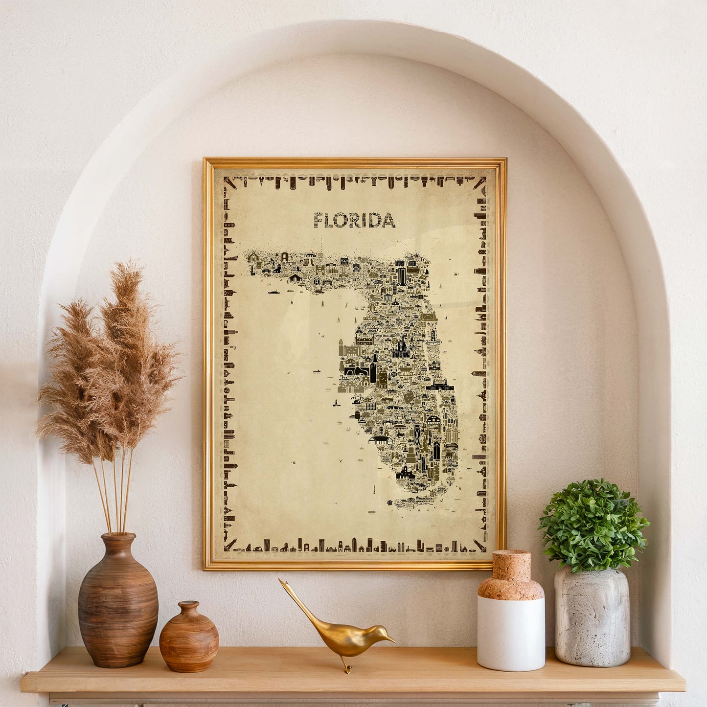 Florida antique map poster in sepia tones displayed in arched niche with gold frame, vintage wall art in sculptural interior setting