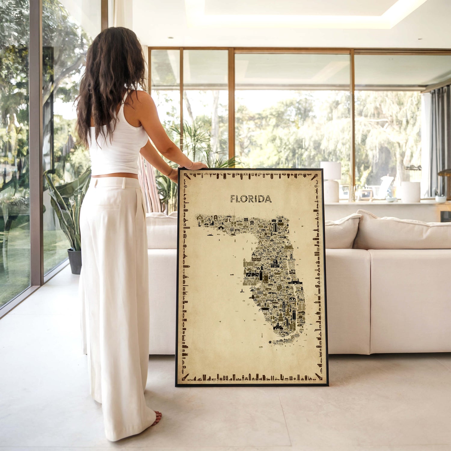 Large Florida antique map poster in sepia tones with black frame in modern home, vintage travel wall art with architectural presence