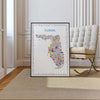 Iconic Florida map poster in black frame on paneled wall with Barcelona chair, colorful Sunshine State wall art in modern luxury interior