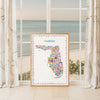Florida map poster in natural wood frame by window with ocean view, coastal décor and travel-inspired wall art of the Sunshine State