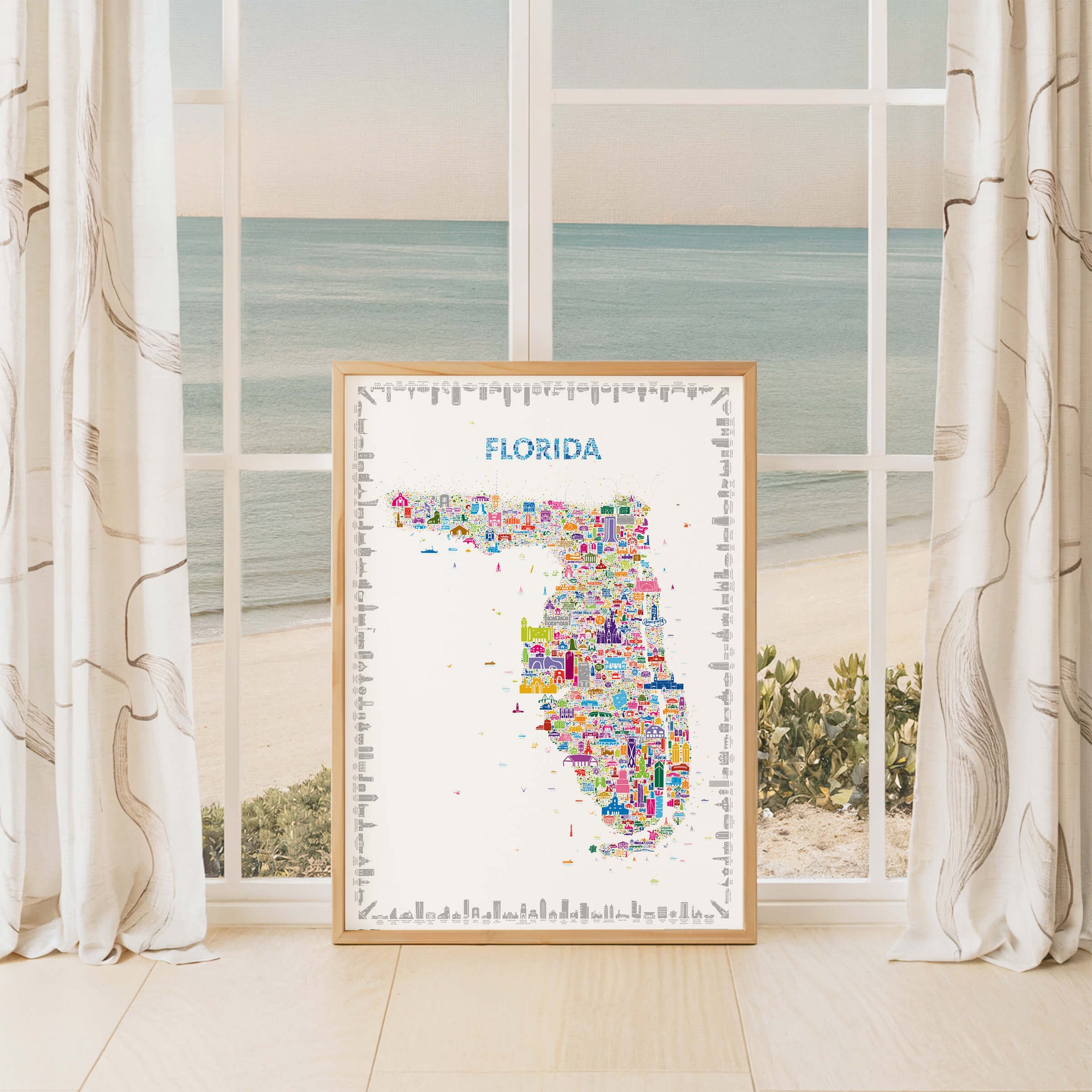 Florida map poster in natural wood frame by window with ocean view, coastal décor and travel-inspired wall art of the Sunshine State