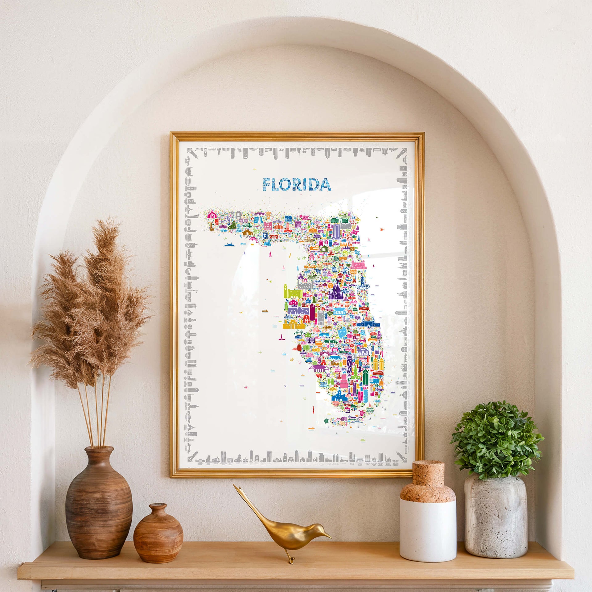 Florida map poster in gold frame placed in arched niche with sculptural décor, artistic wall art for modern interior styling