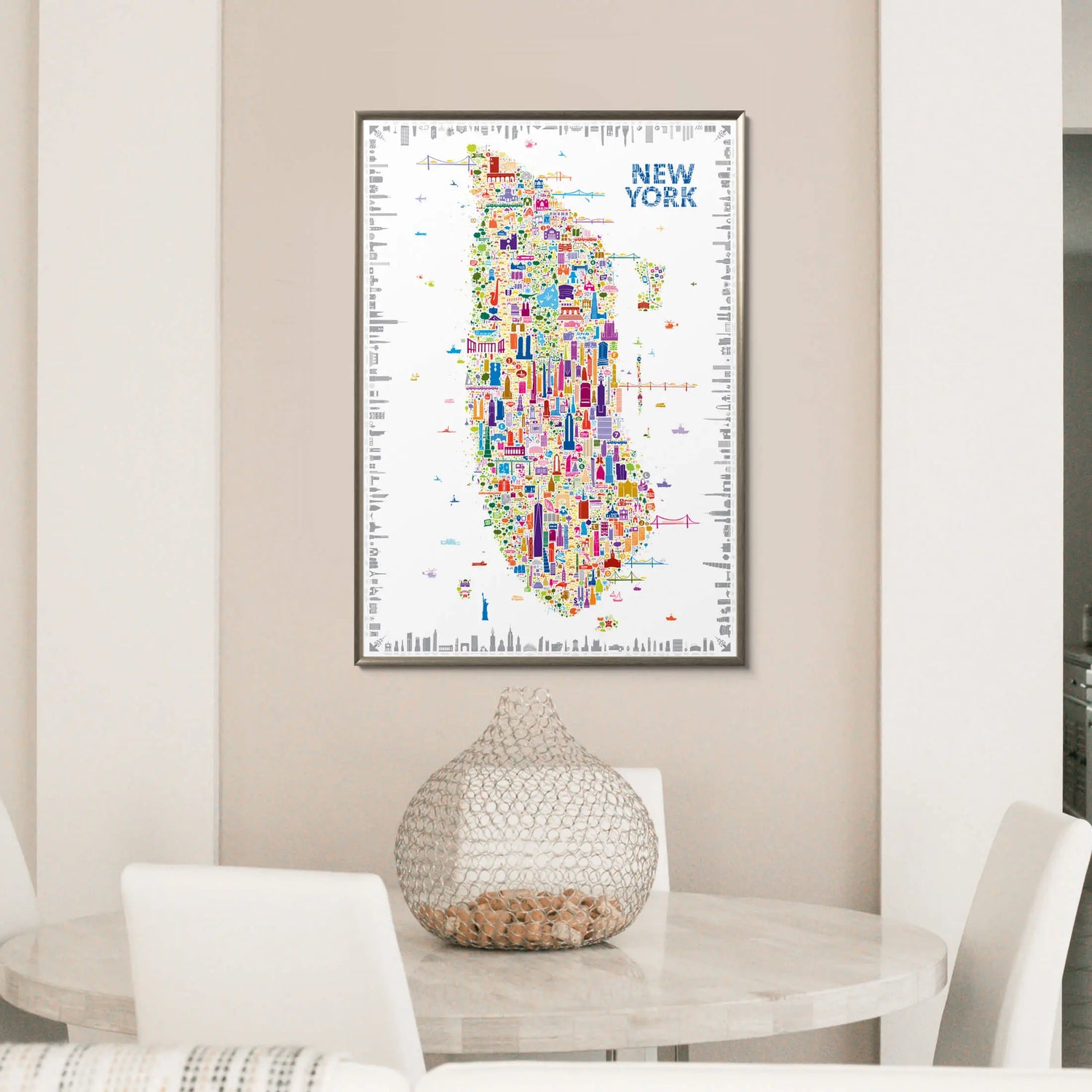 Colorful New York map poster on a wall above a dining table with a decorative vase.