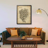 Iconic Tokyo Antique map poster in a black frame displayed above an olive green sofa in a refined living room setting