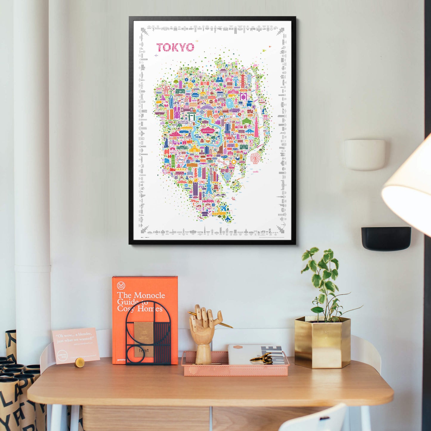 Iconic Tokyo poster in a sleek black wood frame styled in a modern home office above a wooden desk, contemporary wall art for creative workspaces