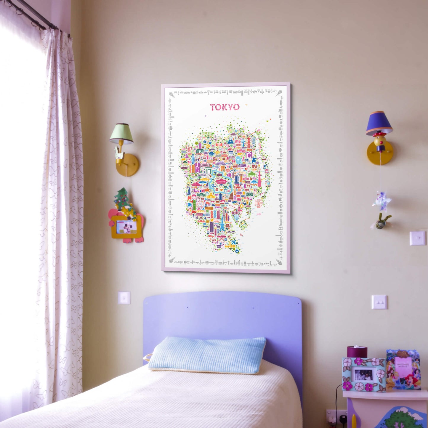 Colorful Iconic Tokyo map poster in a light pink frame hanging in a pastel kid’s room, playful and artistic wall décor with soft violet and pink interior styling