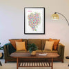 Iconic Tokyo map poster in a black frame above an olive green modern sofa, stylish living room décor with contemporary city artwork