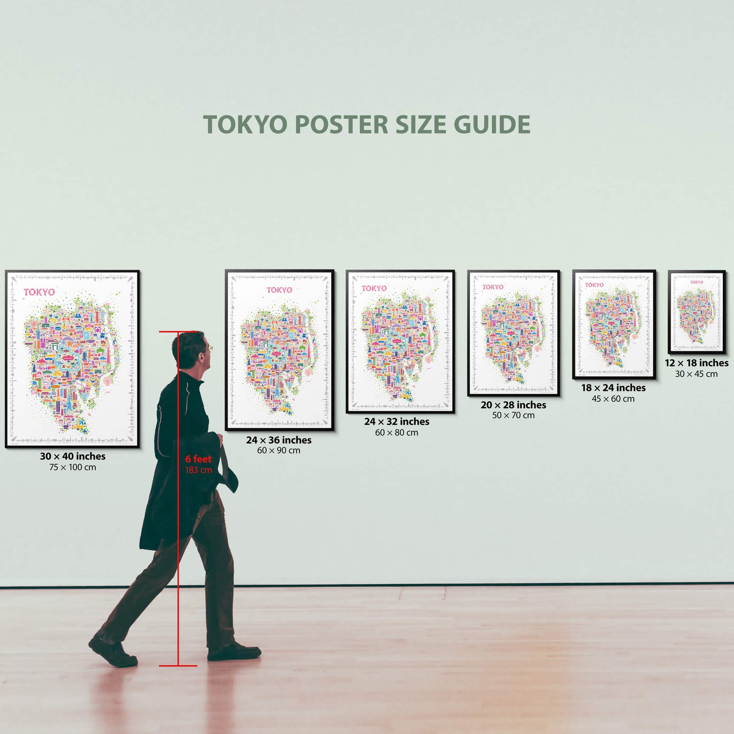 Iconic Tokyo poster displayed in six framed sizes with a six-foot-tall man for scale, modern gallery wall showcasing wall art dimensions in inches and centimeters