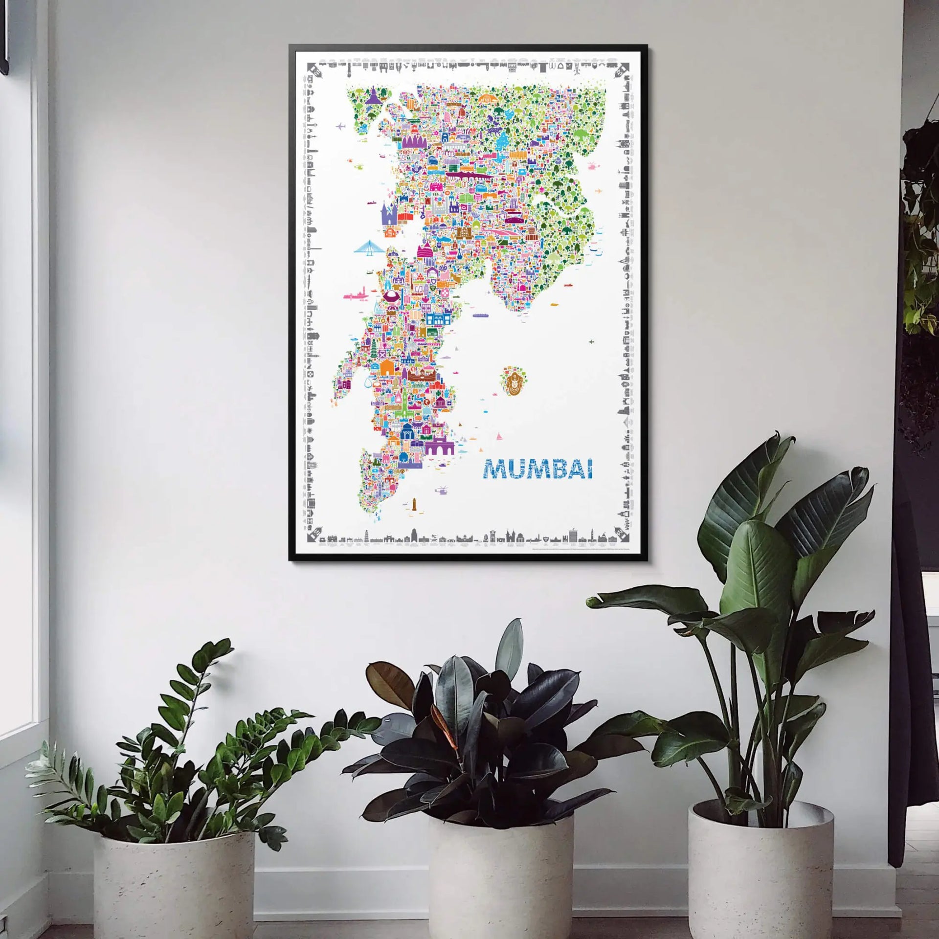 Colorful map of Mumbai on a wall with potted plants below