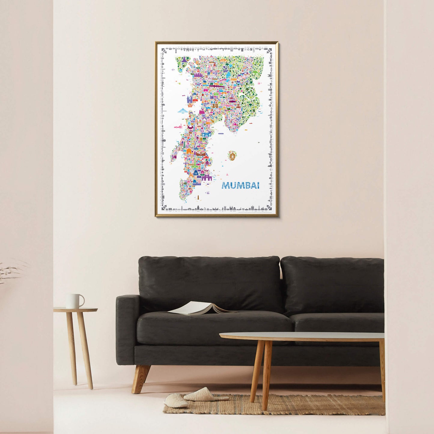 Colorful Mumbai city map art print framed in natural oak wood, displayed above a modern grey sofa — minimalist wall art decor by Alfalfa New York.