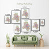 Colorful New Delhi illustrated map poster size guide showing seven framed print sizes from 12 x 18 to 30 x 40 inches above a green sofa.