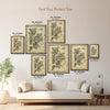 New York City Five Boroughs Antique illustrated map poster size guide showing seven framed print sizes from 12 x 18 to 30 x 40 inches above a neutral sofa.