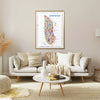 Living room with a colorful Manhattan map on the wall above a sofa.