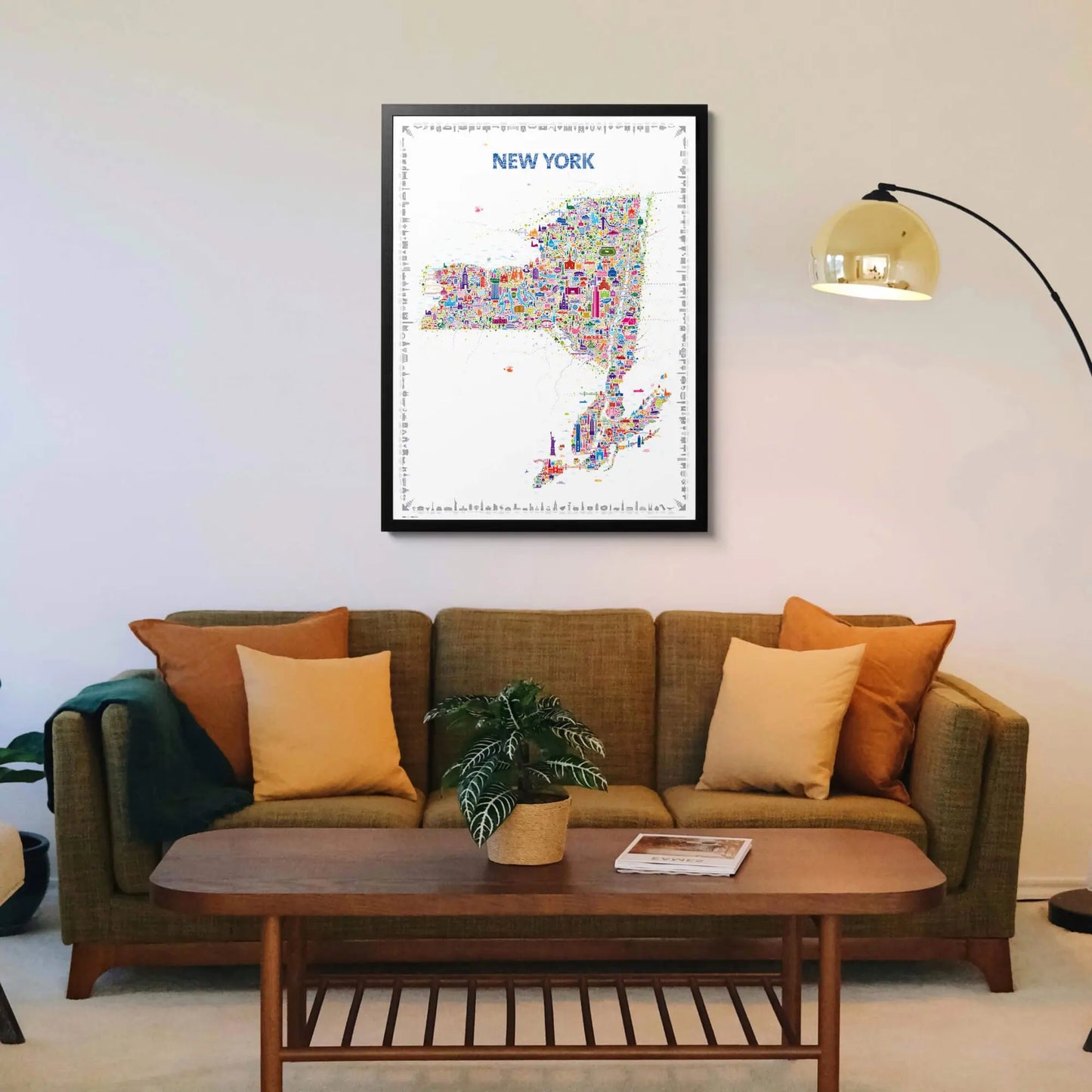 Living room with a framed map of New York on the wall above a sofa.