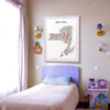 Children's bedroom with a map of New York on the wall above a bed.
