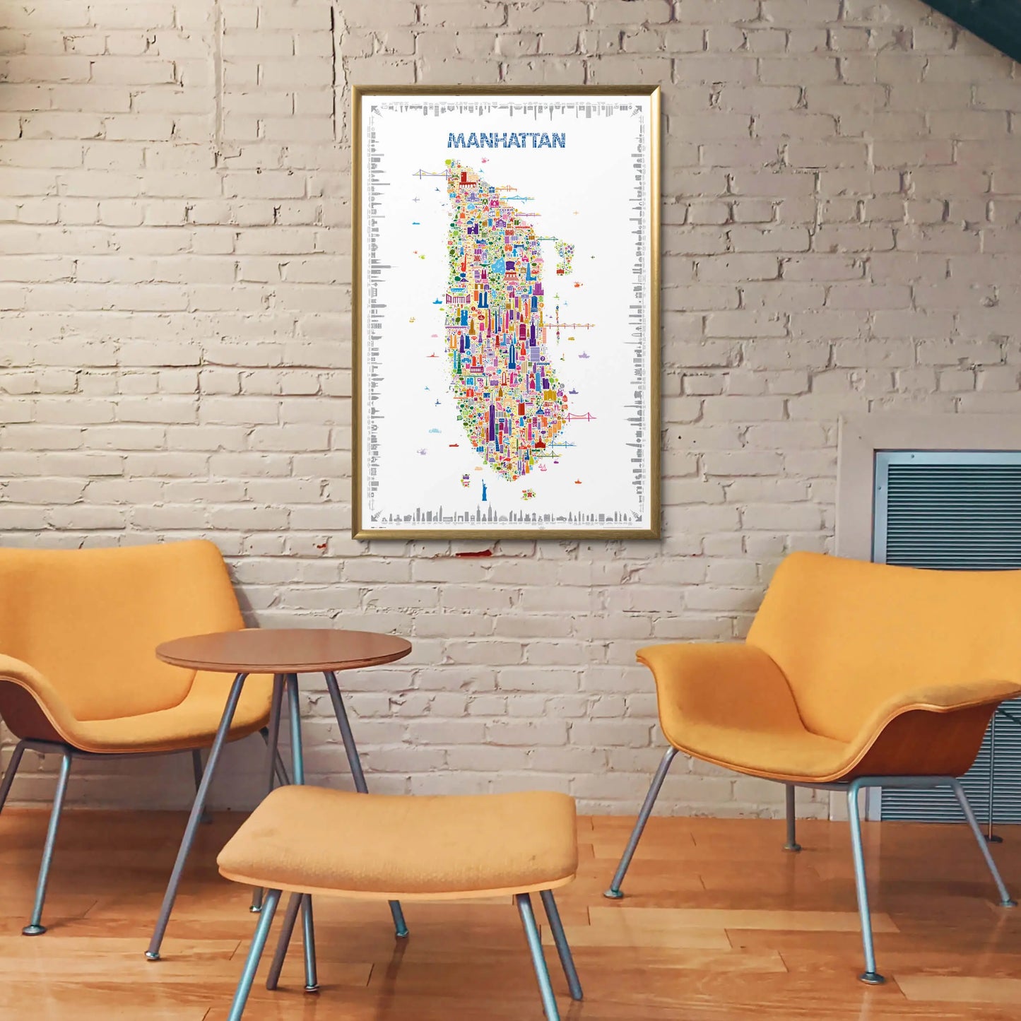 Colorful map of Manhattan on a wall above two orange chairs and a small table.