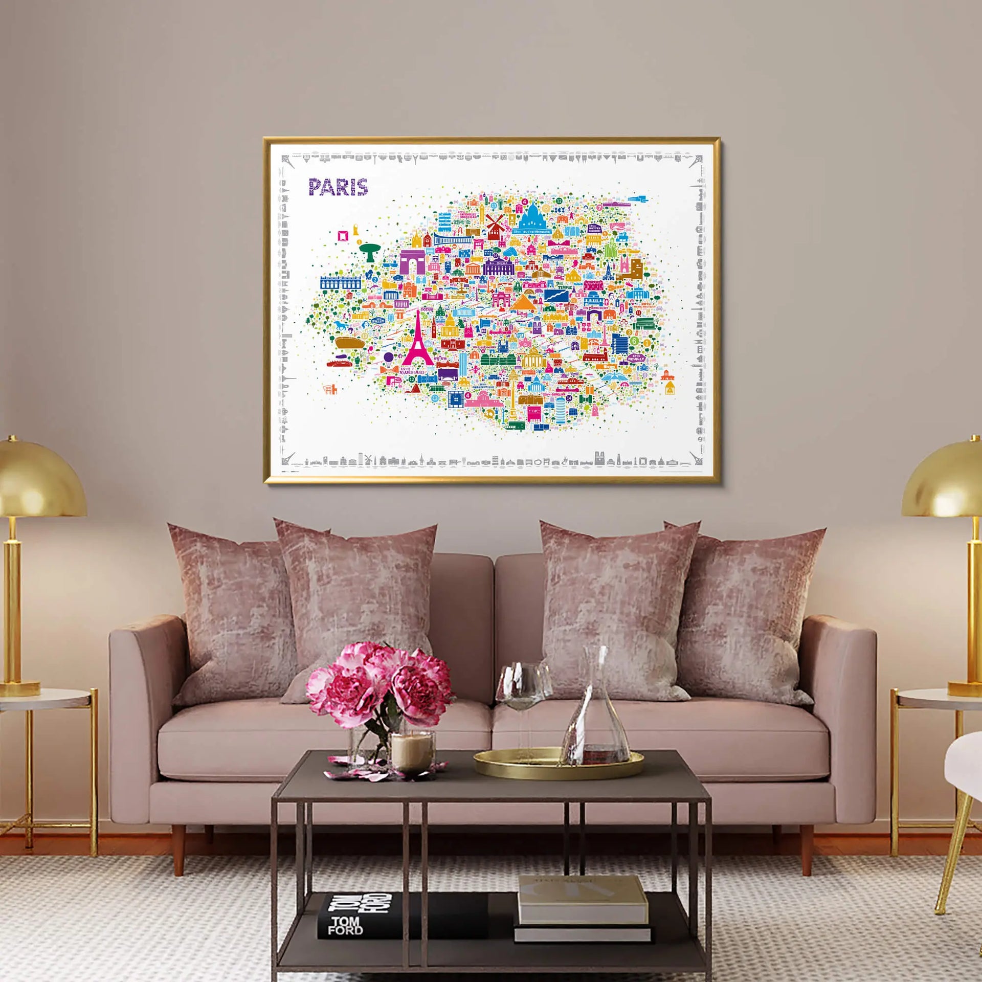 Iconic Paris colorful illustrated map poster in gold frame displayed above elegant blush pink velvet sofa in luxury living room