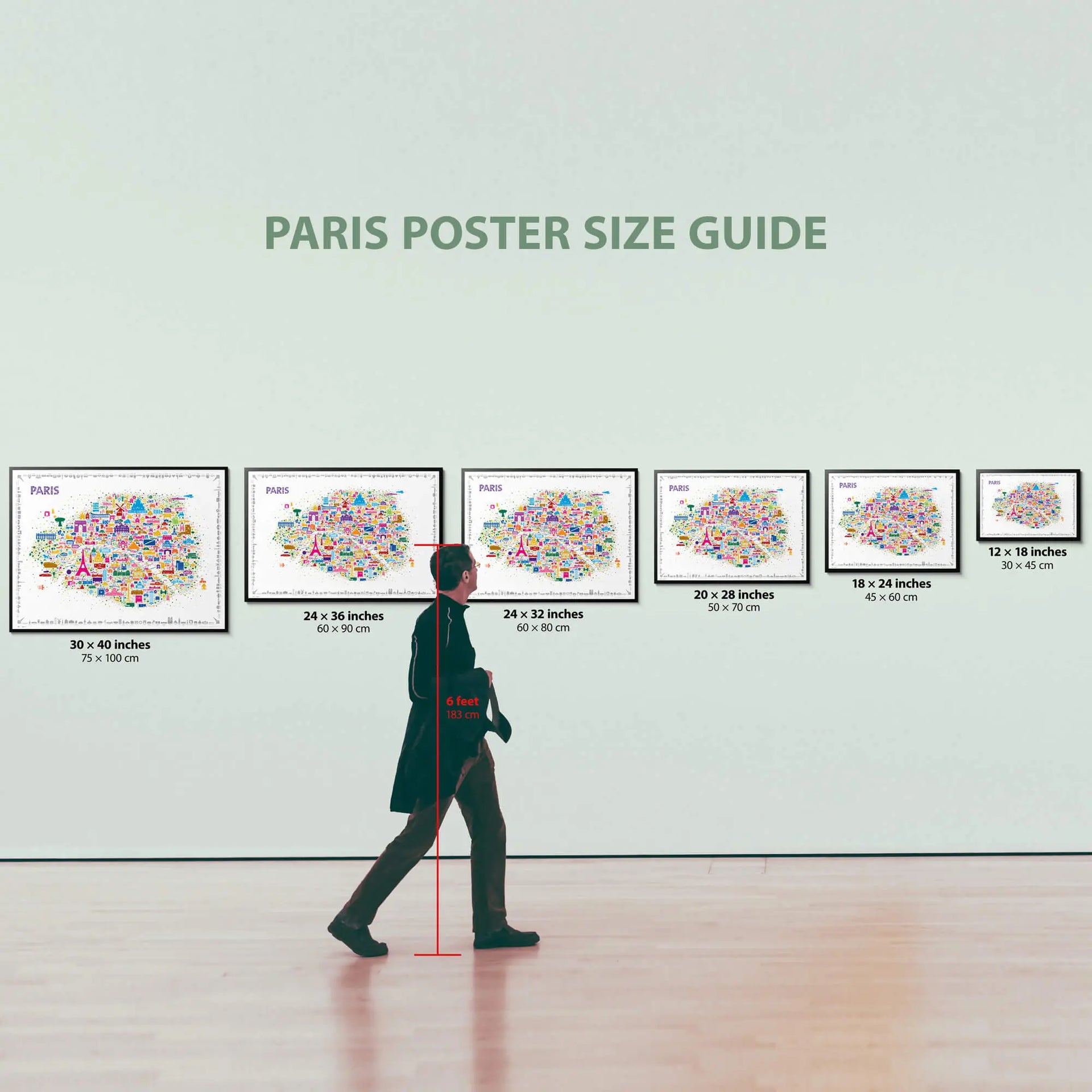 Person standing in front of Paris poster size guide on a wall