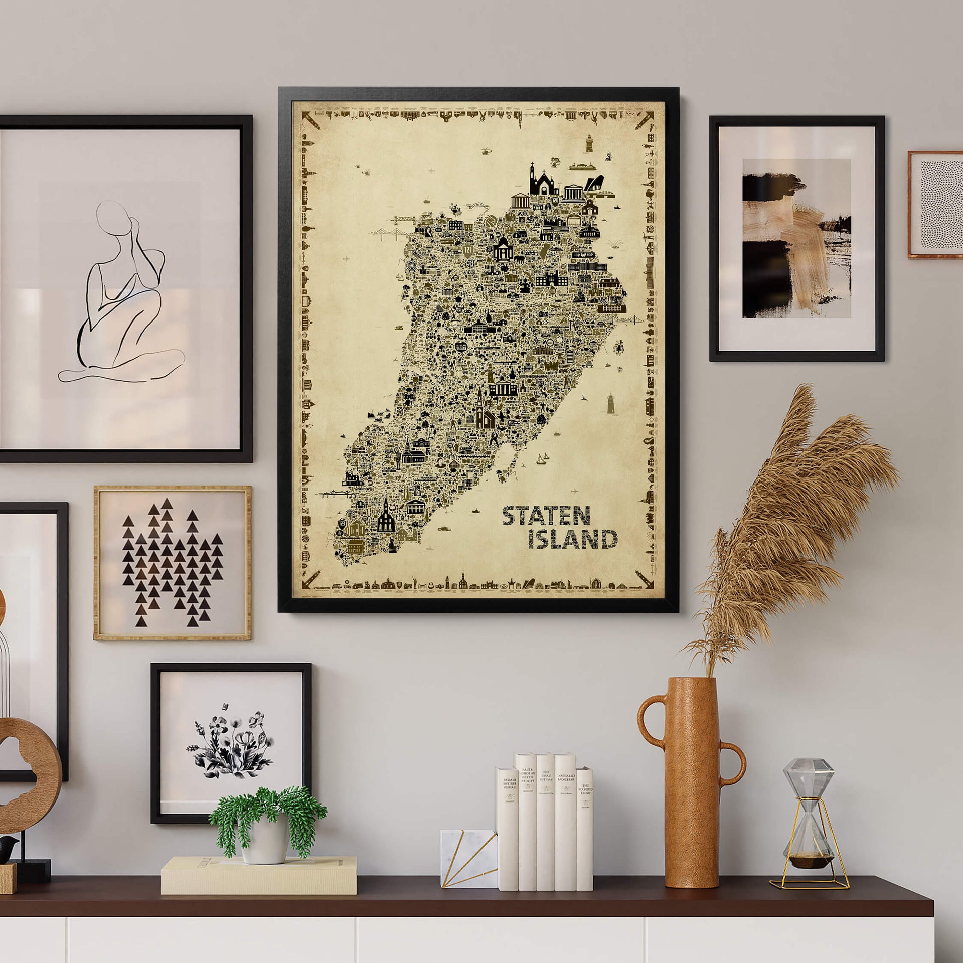Iconic Staten Island Antique Edition featured within a curated gallery wall of framed artwork, creating sophisticated vintage New York home décor.