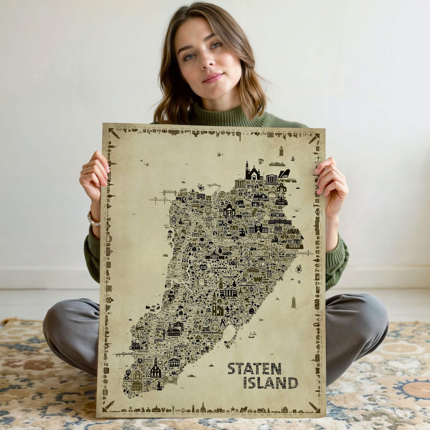Woman holding the unframed Iconic Staten Island Antique Edition illustrating the actual scale of the premium matte paper poster. Perfect Staten Island gift and New York wall art.
