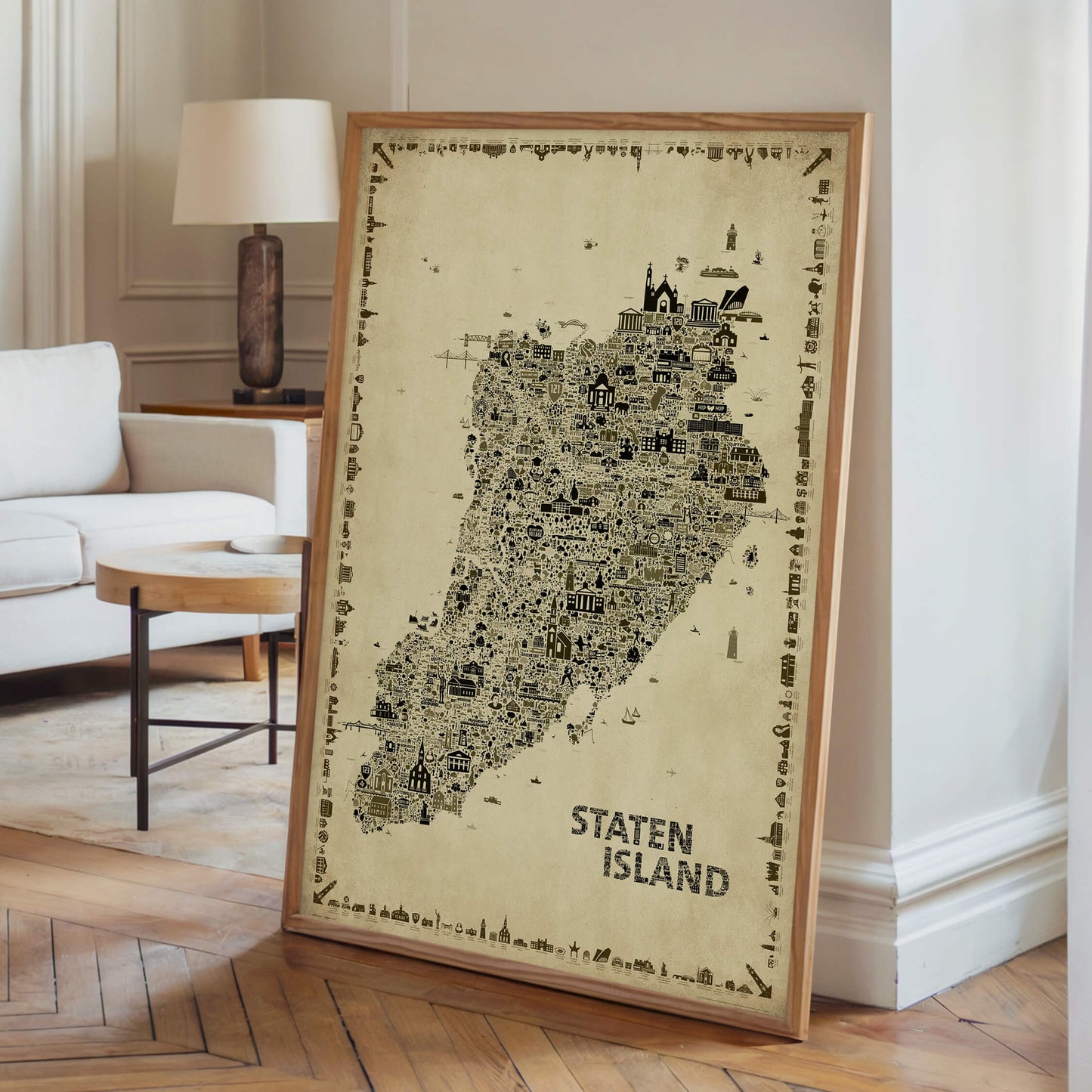 Framed Iconic Staten Island Antique Edition vintage map poster displayed in a modern living room. Sepia artwork inspired by old-world cartography and New York City décor.