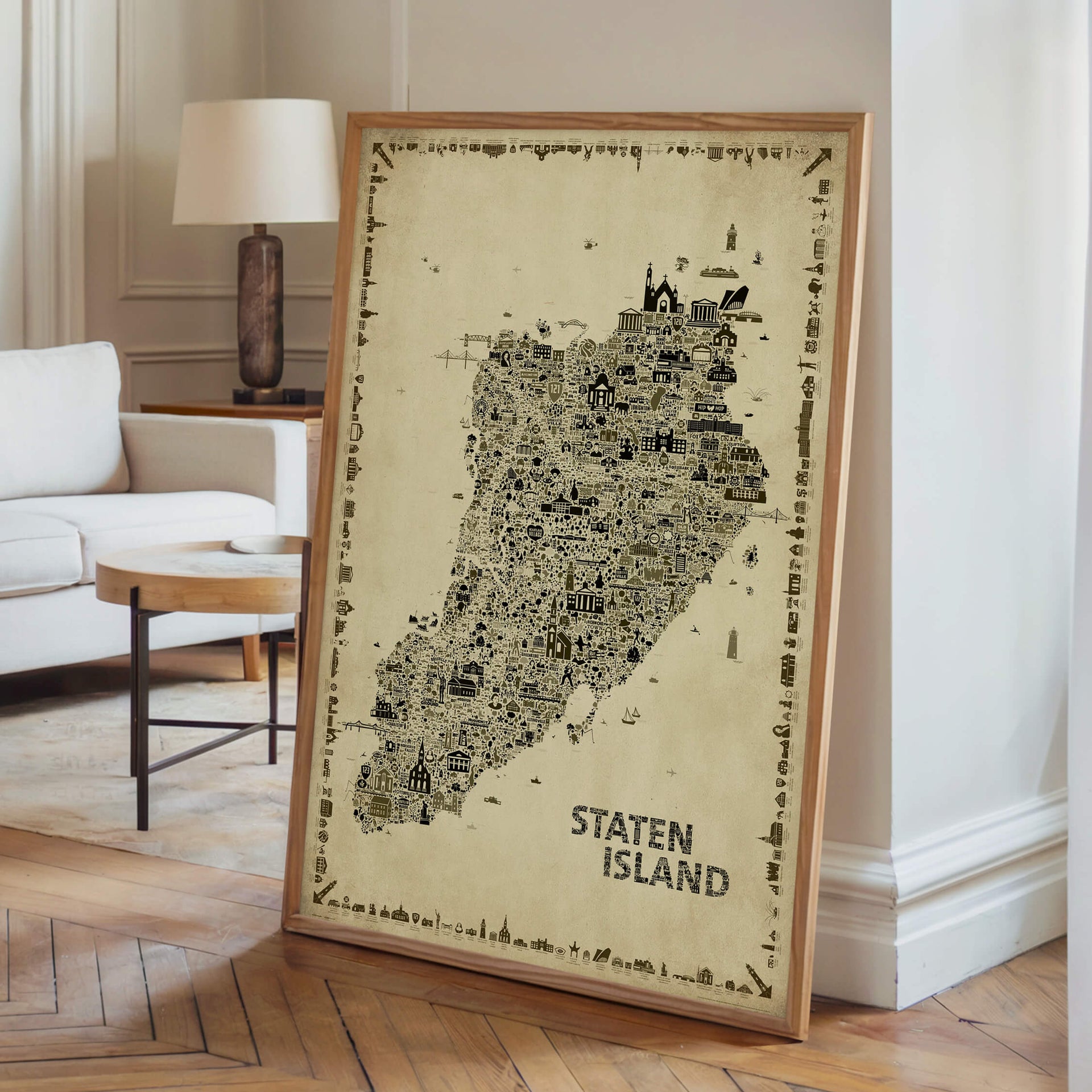 Framed Iconic Staten Island Antique Edition vintage map poster displayed in a modern living room. Sepia artwork inspired by old-world cartography and New York City décor.
