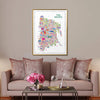 Colorful map of The Bronx on a wall above a sofa with decorative pillows.