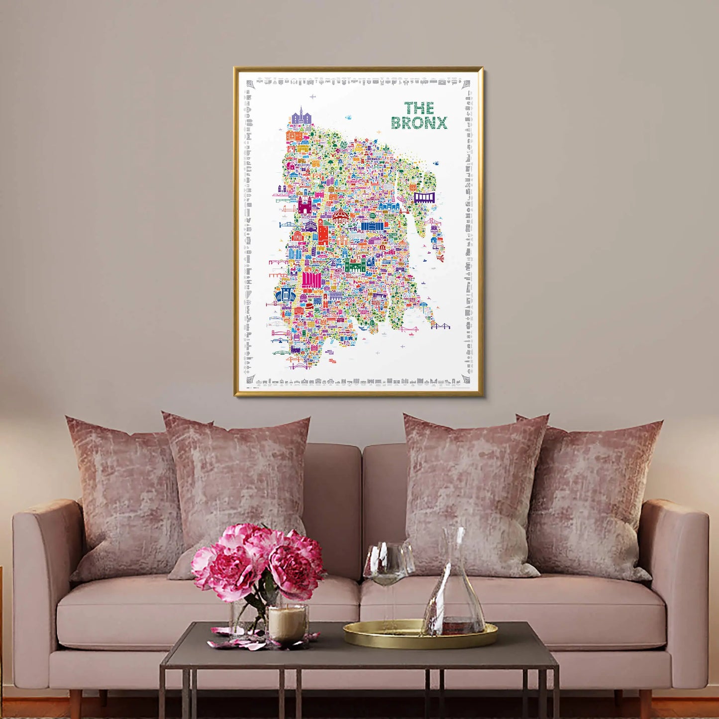 Colorful map of The Bronx on a wall above a sofa with decorative pillows.